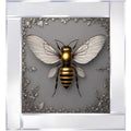 A gleaming silver abstract Manchester bee, symbolizing strength and community