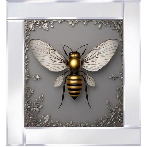 A gleaming silver abstract Manchester bee, symbolizing strength and community
